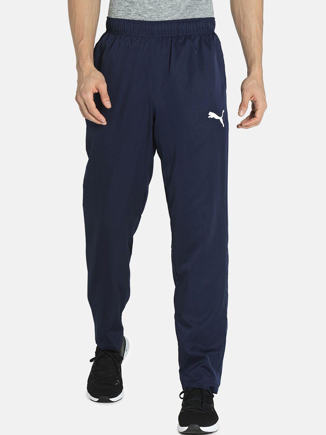 puma men navy blue solid regular fit track pants with drycell technology