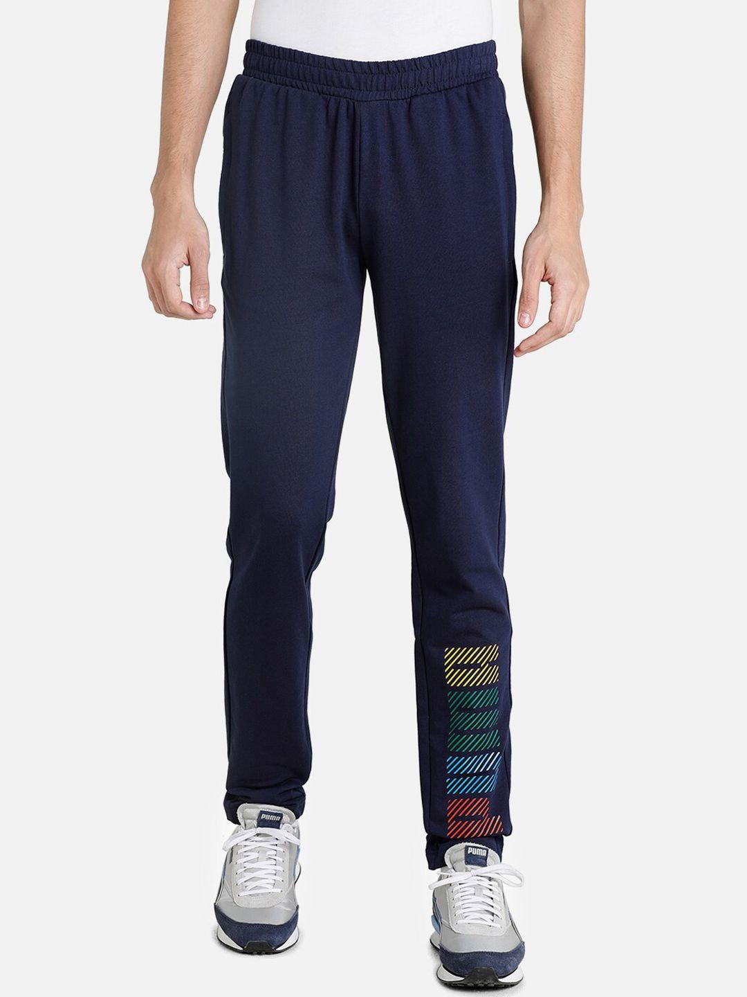 puma men navy blue solid regular fit track pants