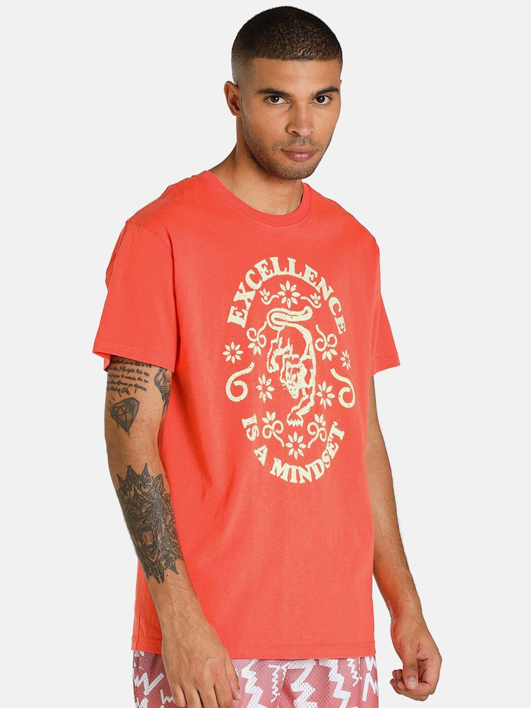 puma men orange colored graphic printed pure cotton  tshirts