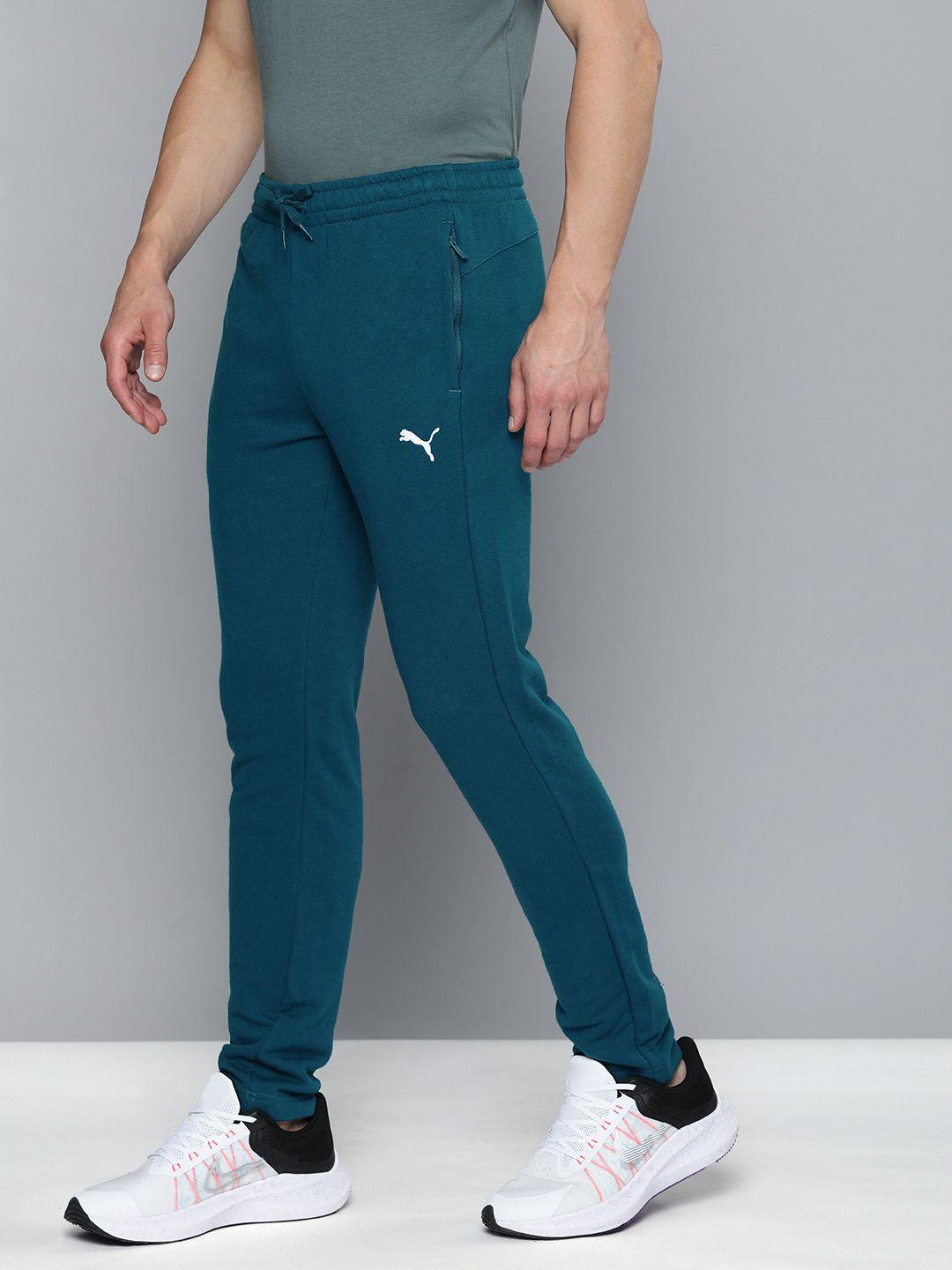 puma men teal blue slim fit solid zippered knitted sweat track pants