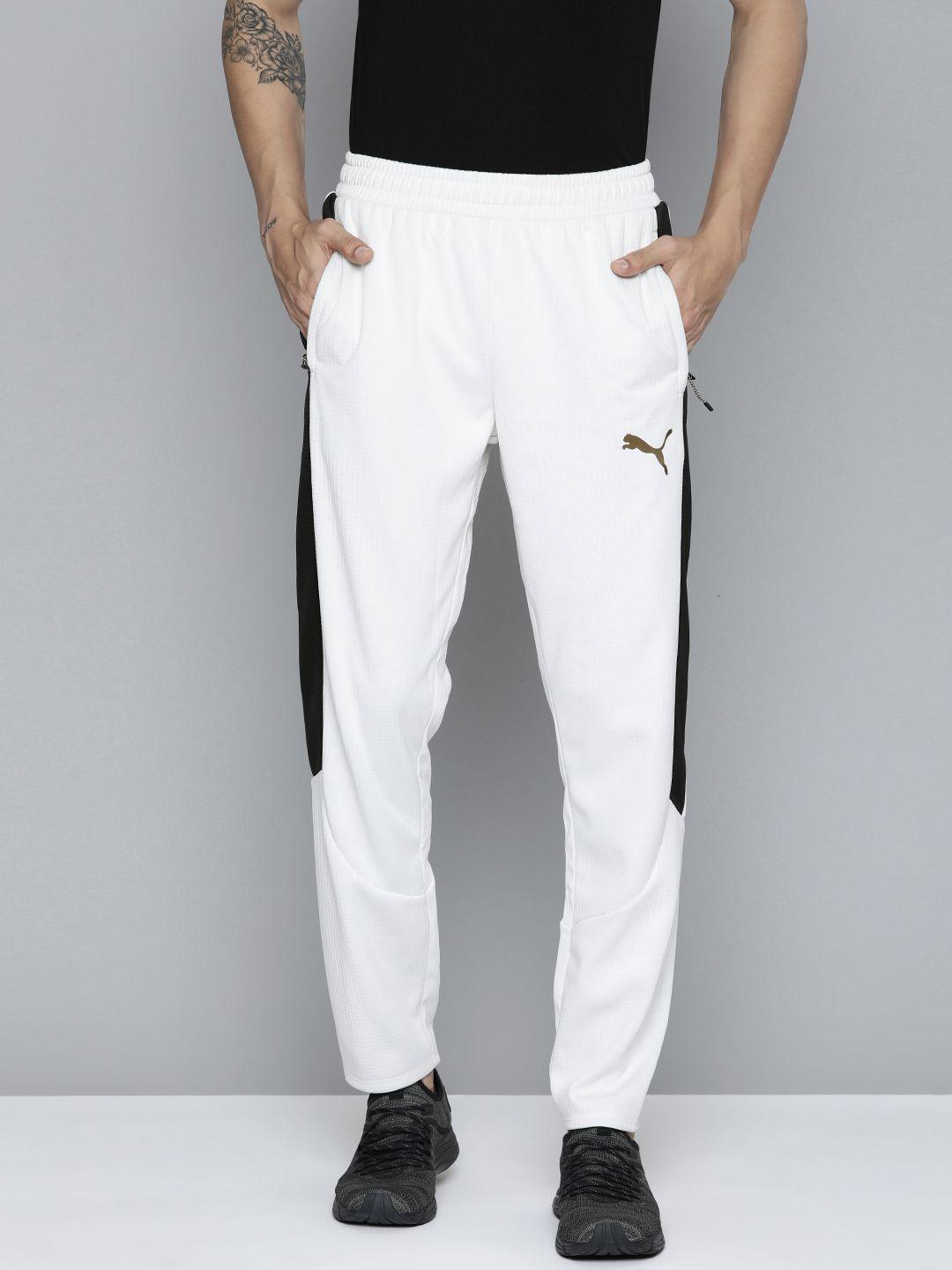 puma men white checked self design slim fit mid-rise evostripe warmcell track pants