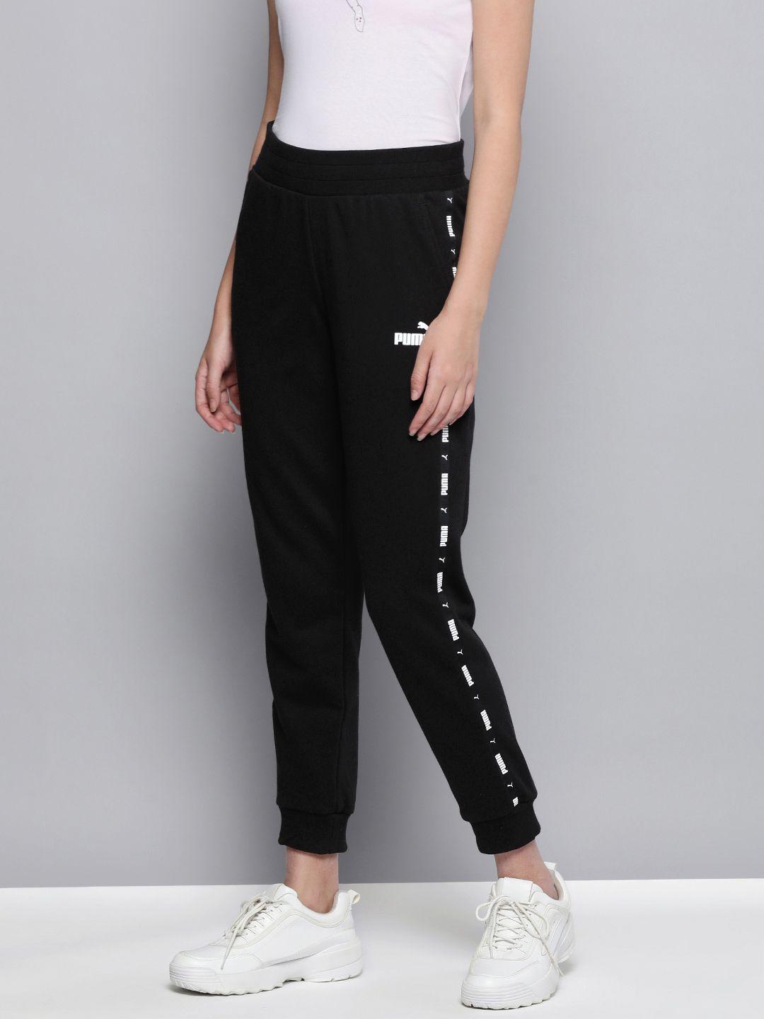 puma women black brand logo side taped sustainable joggers