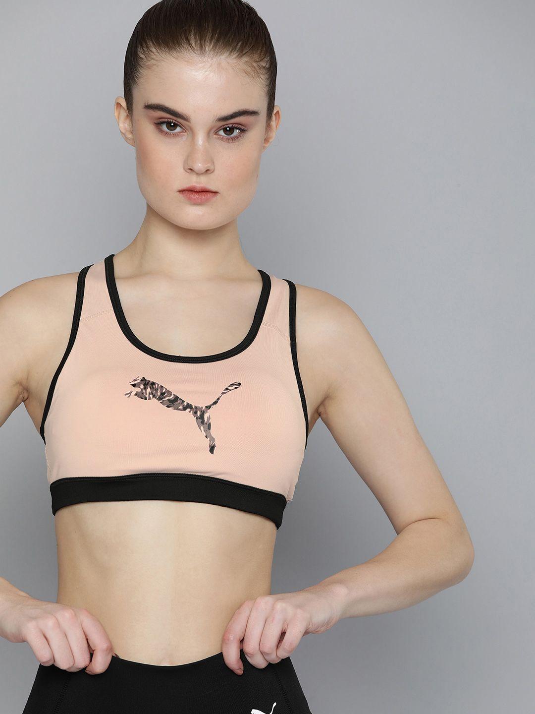 puma women peach-coloured & black graphic printed drycell sports bra 52030647