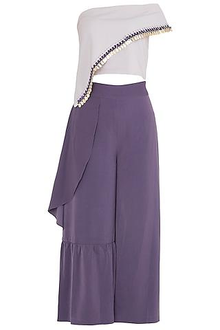 purple asymmetrcial off shoulder top with ruffled culottes