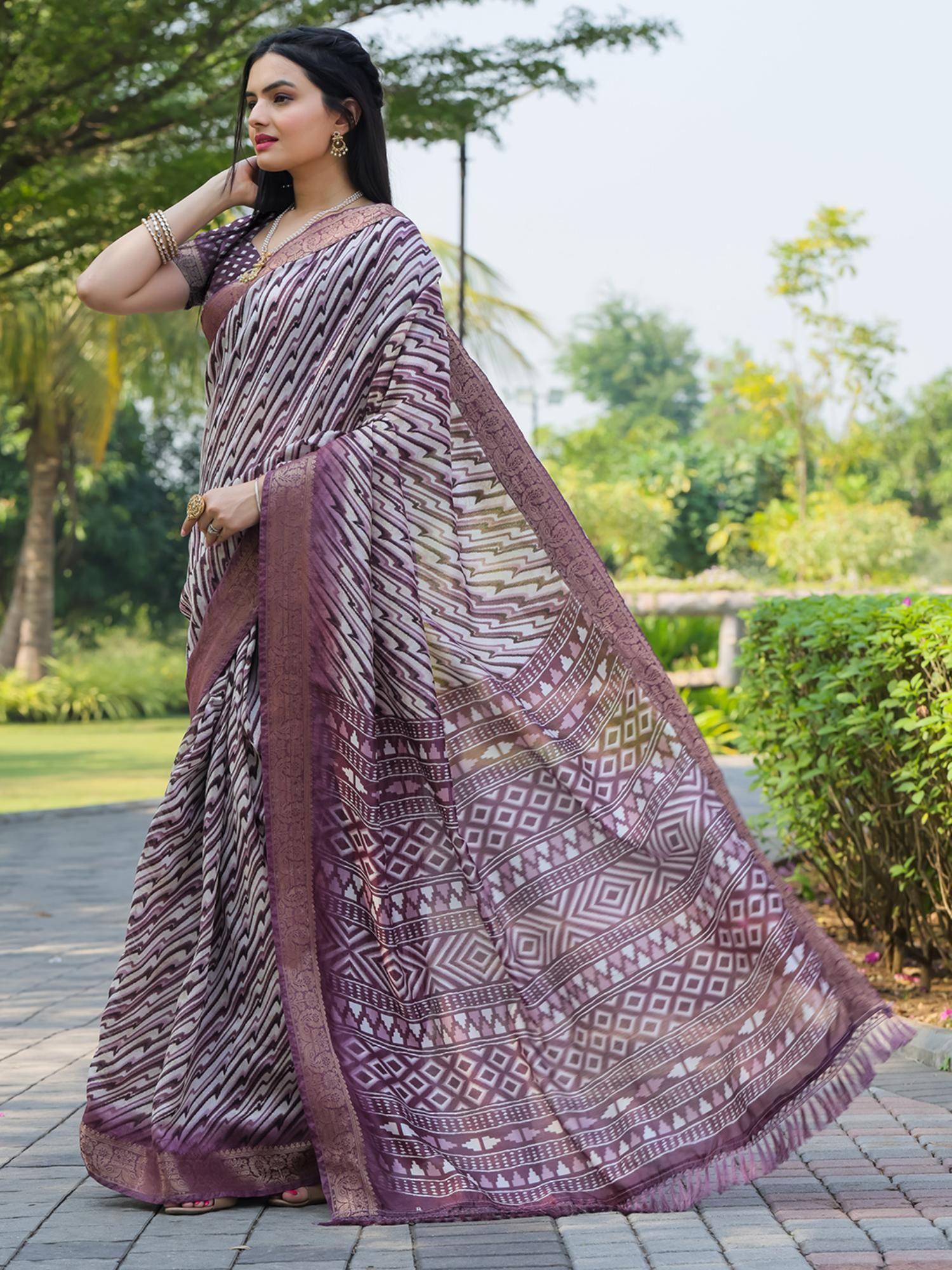 purple colored cotton blend saree with unstitched blouse