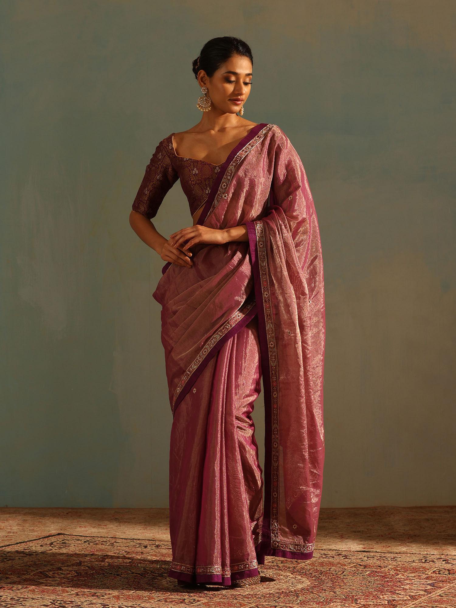 purple hand tissue saree with zardozi and raw border