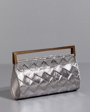quilted handbag with metal accent