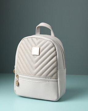 quilted backpack with zip closure