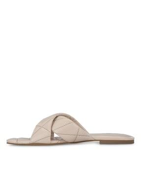 quilted cross-strap slip-on sandals