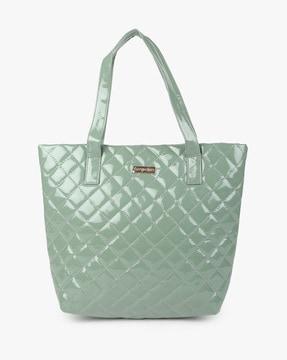 quilted patent tote bag with metal logo accent