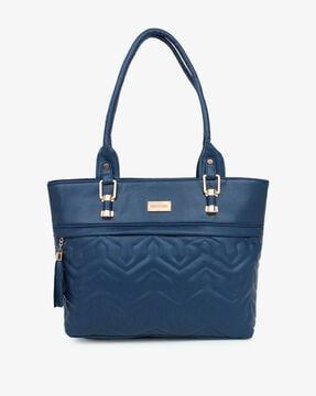 quilted shoulder bag with external zip pocket