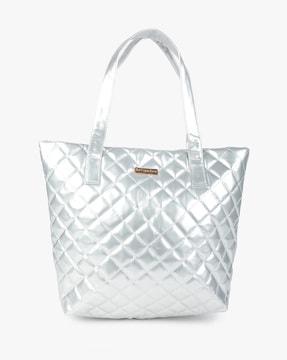 quilted tote bag with metal logo accent