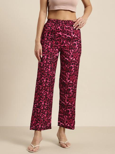 qurvii wine animal print trousers