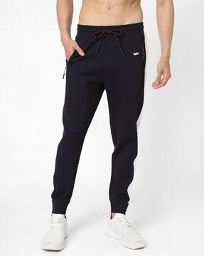 radar slim fit track pants with contrast side taping