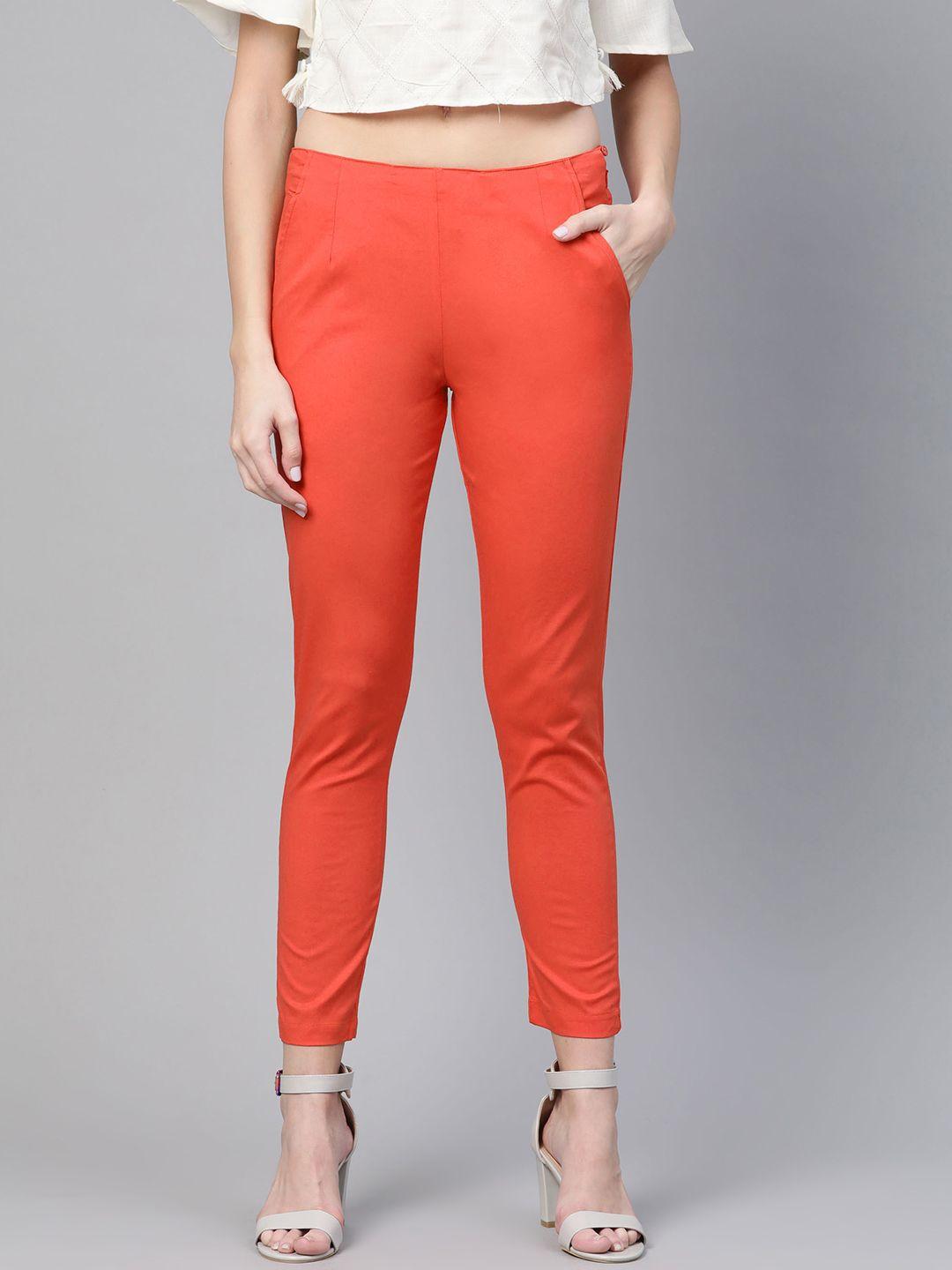 rangriti women orange slim fit solid regular trousers