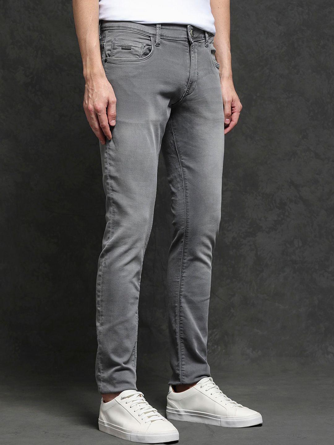 rare rabbit men slim fit clean look stretchable jeans