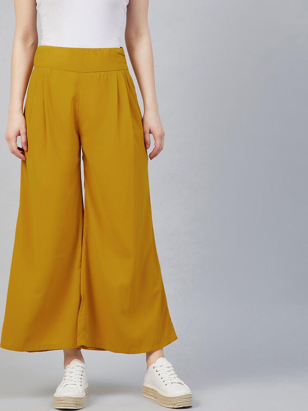 rare women yellow pleated trousers
