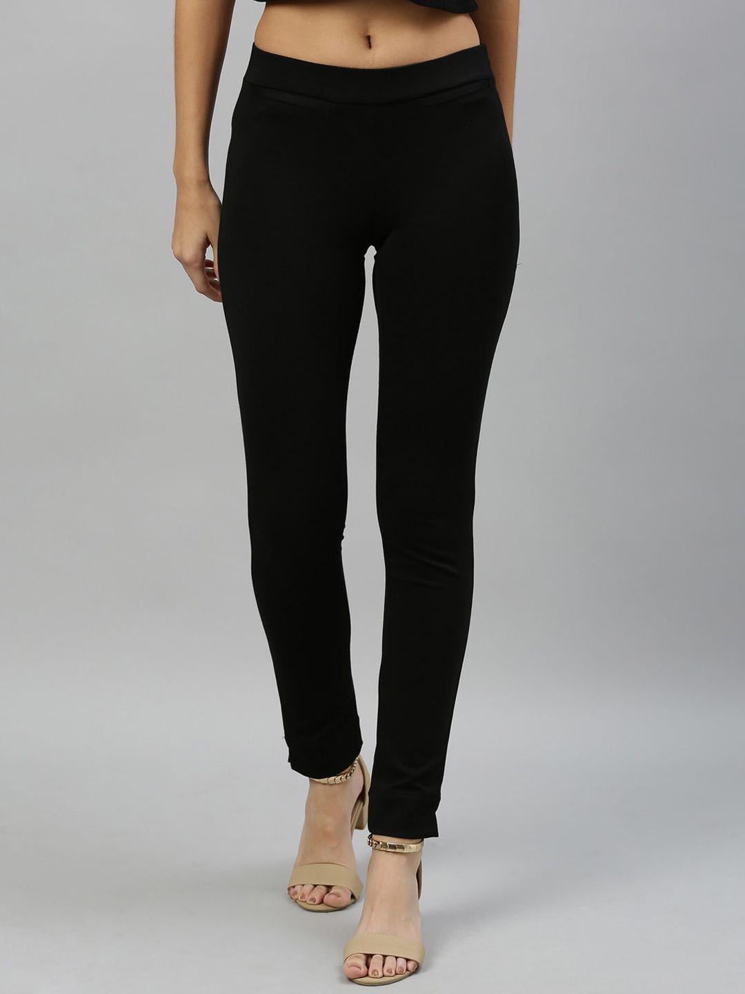 rareism women black slim fit solid regular trousers