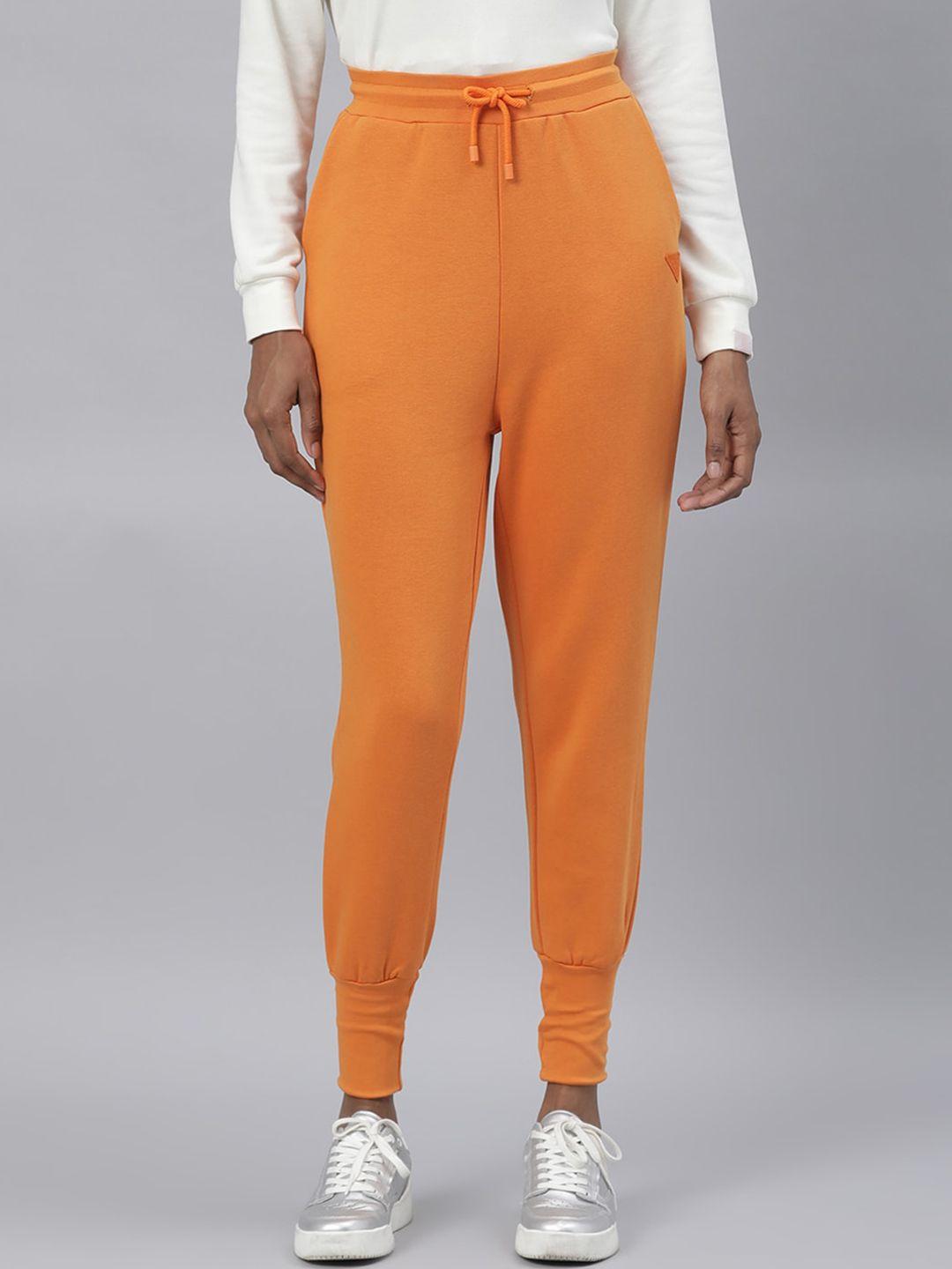 rareism women orange solid slim fit joggers