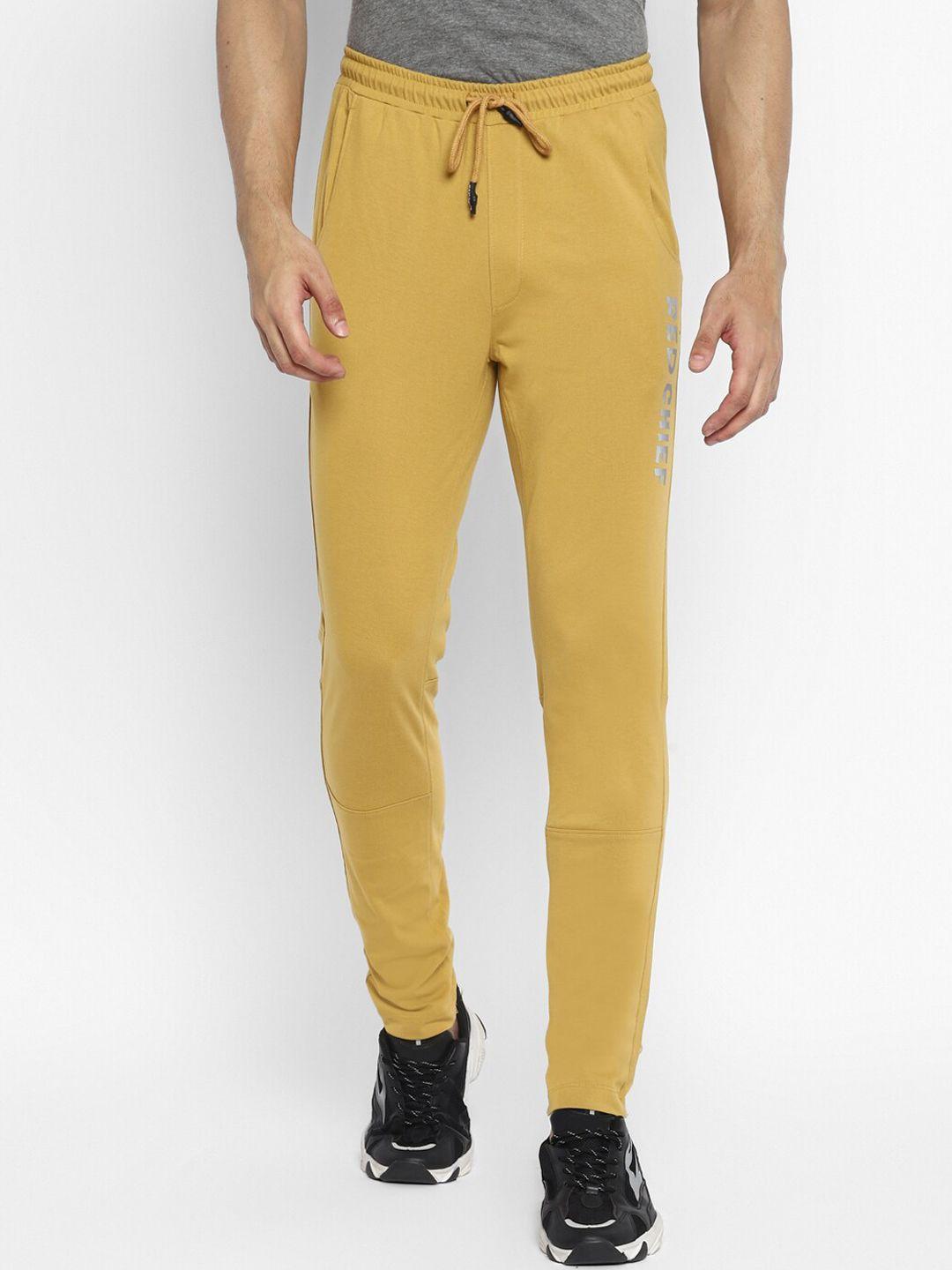 red chief men yellow solid slim-fit track pants