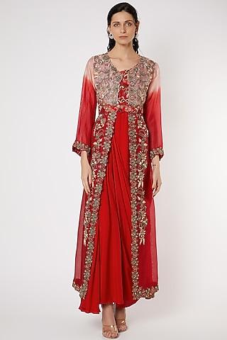red draped gown with embroidered jacket