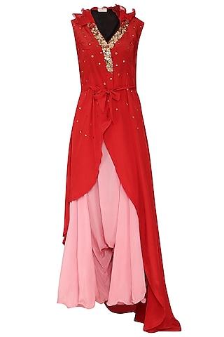 red embellished tunic with pink drape pants and belt
