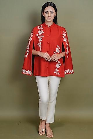 red embroidered cape