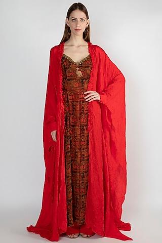 red embroidered tunic with cape