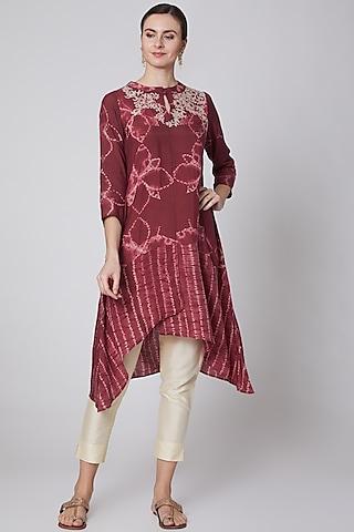red embroidered tunic