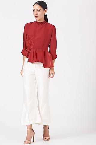 red floral embroidered asymmetrical peplum top