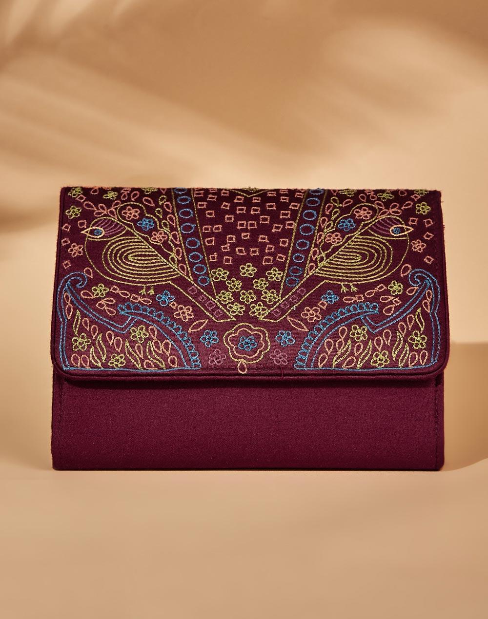 red modal embroidered clutch