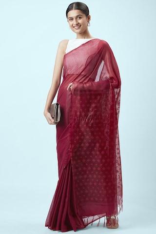 red patterned polyester sari