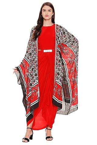 red printed dress with cape