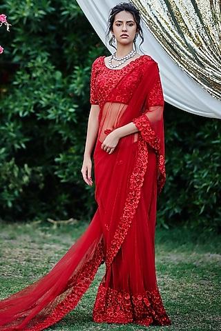 red saree set with floral motifs