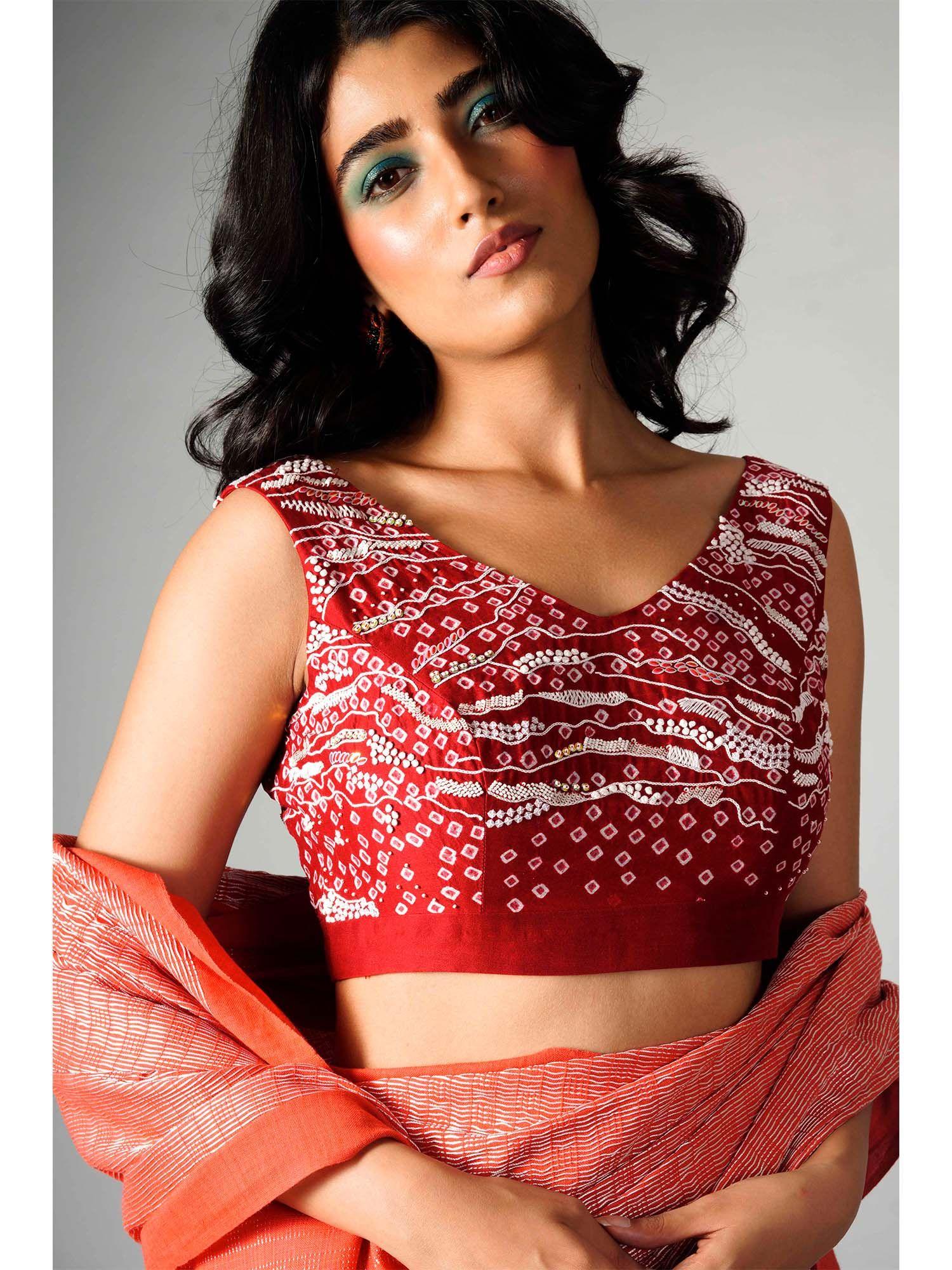 red bandhani and embroidered stitched blouse