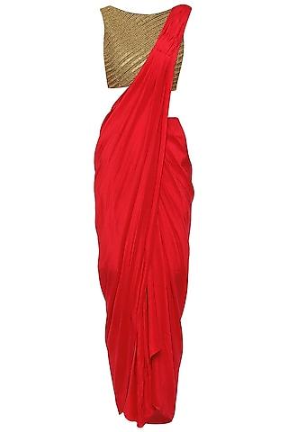 red drape skirt with embroidered croptop and cape