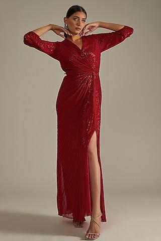 red embellished draped gown