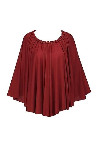 red embellished poncho