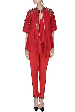 red embroidered jacket with tube top and jodhpuri pants