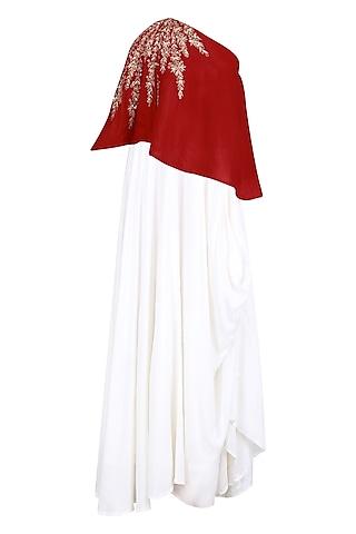 red embroidered one shoulder top with white cowl skirt