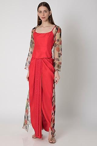 red embroidered top with draped skirt & printed cape