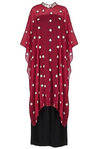 red floral embroidered cape with black palazzo pants