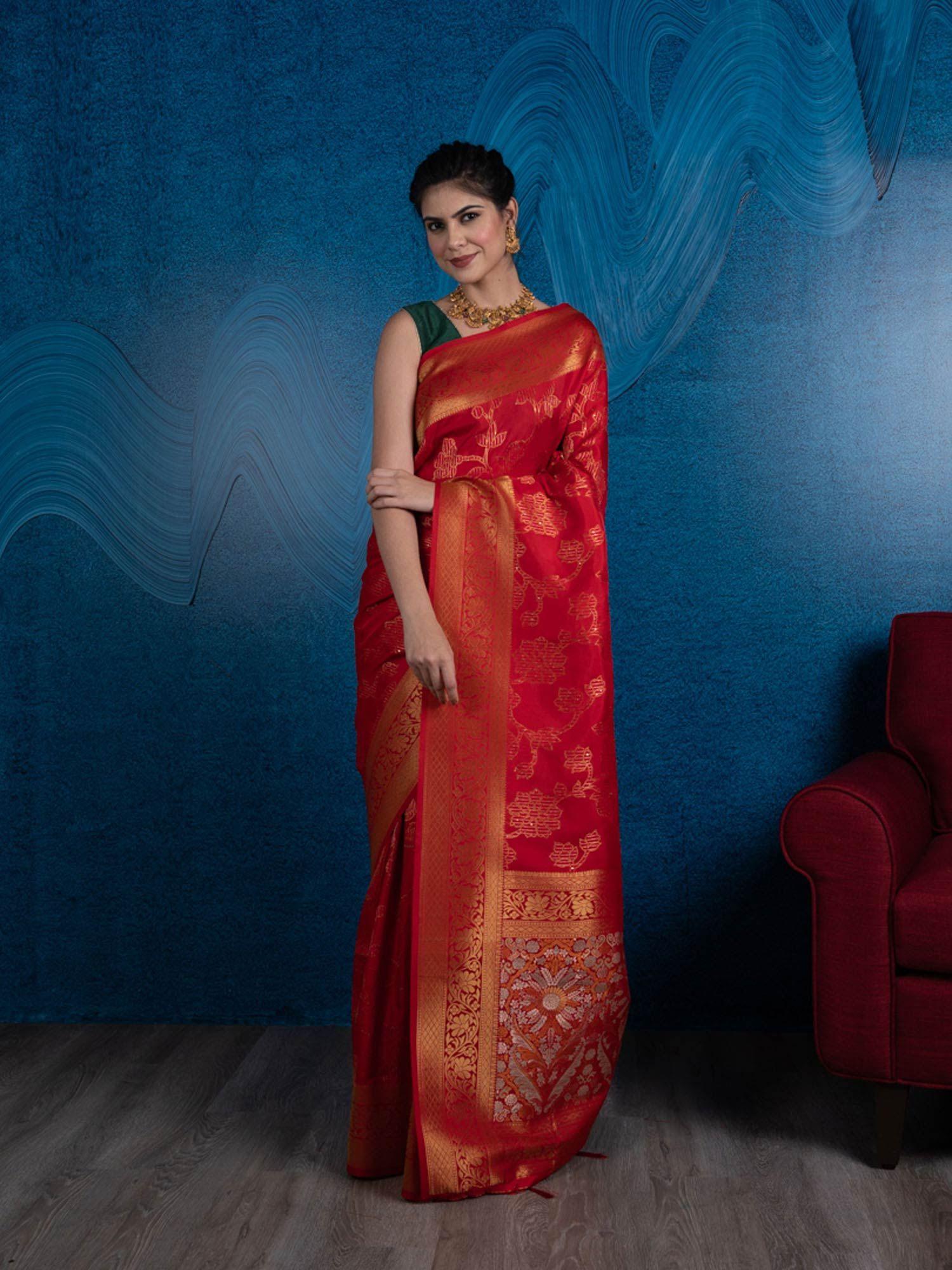 red gold-toned floral silk blend banarasi saree with unstitched blouse