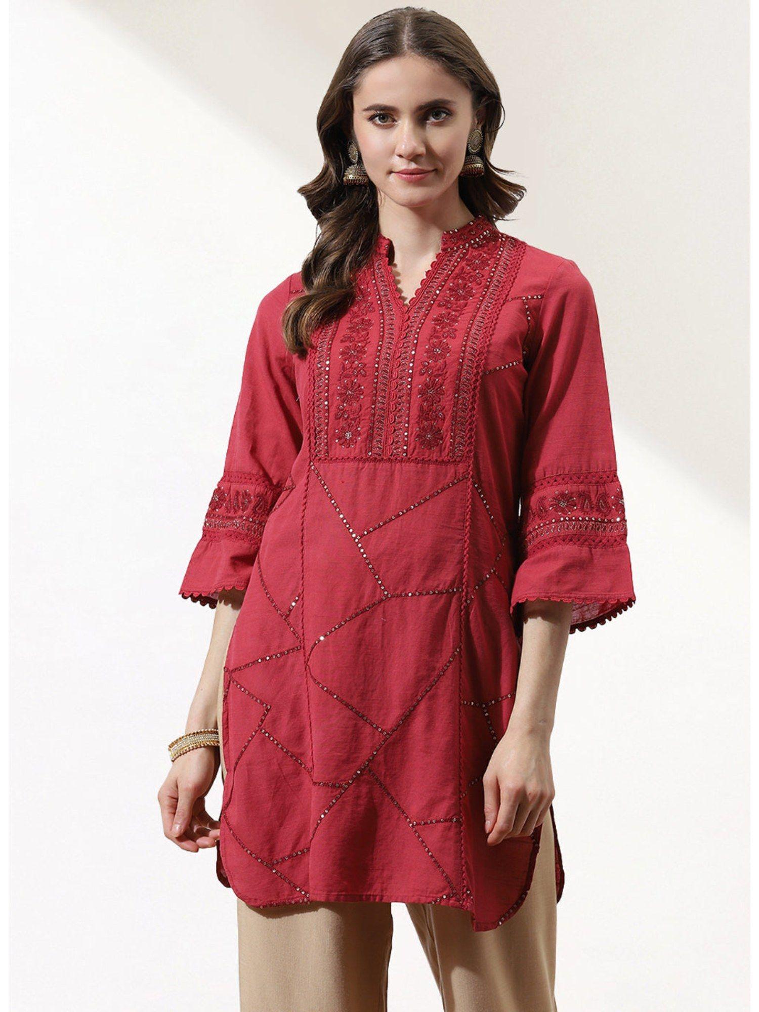 red kurti with delicate embroidery