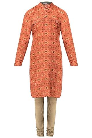 red muslin ikkat printed kurta with antique gold churider