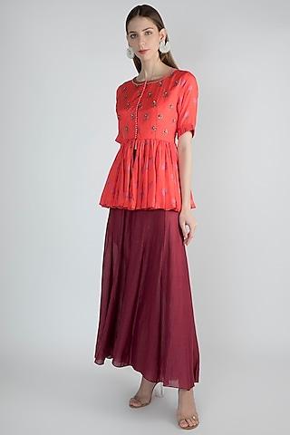 red printed peplum top with magenta palazzo pants