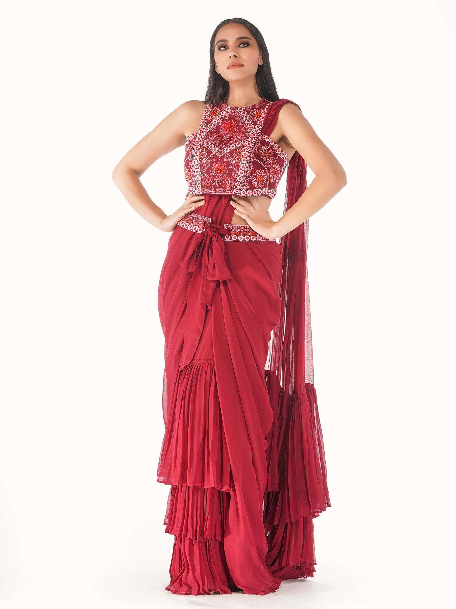 red ruffle draped saree with stitched blouse