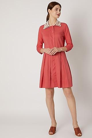 red tunic with embroidered collar