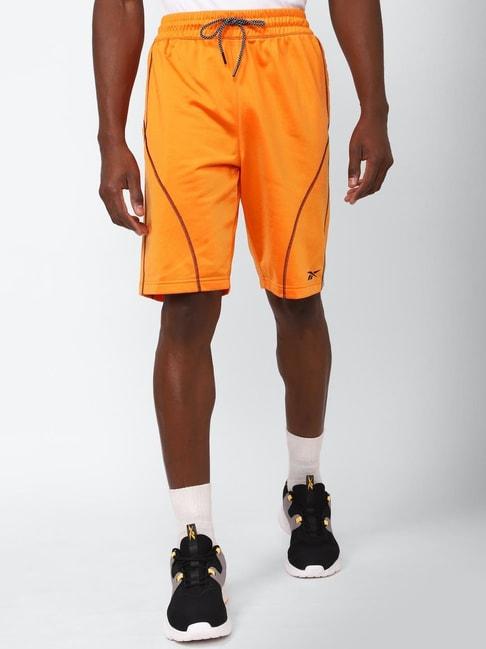 reebok orange slim fit printed shorts