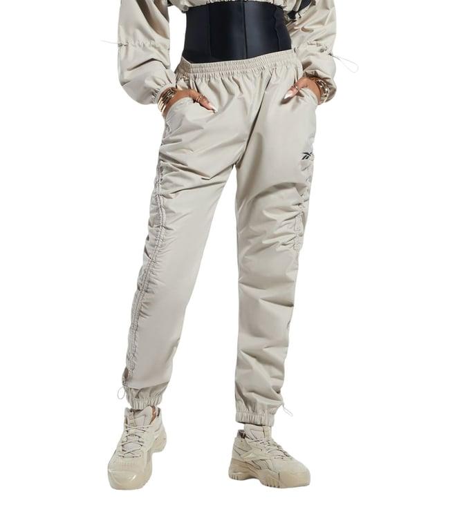 reebok beige loose fit trackpants